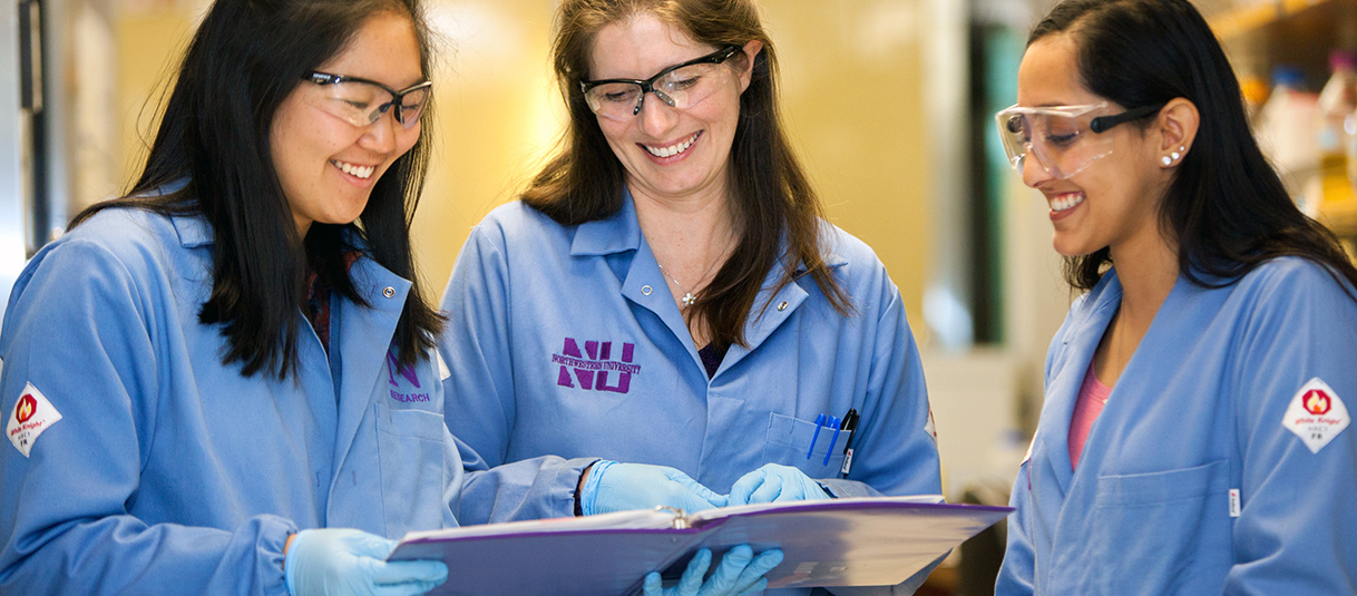 Northwestern University engineering researchers collaborating in a lab